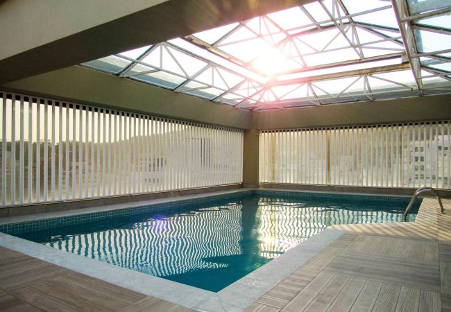 Apartamento em Guarujá - Apto a 200 m da Praia das Pitangueiras-Guarujá/SP