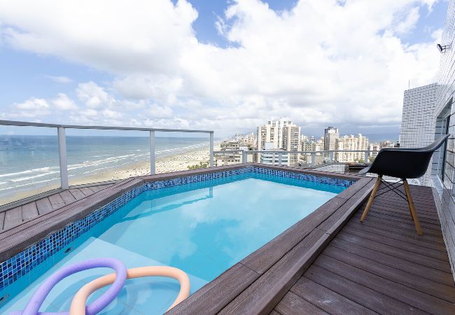 Apartamento em Praia Grande - Cobertura a beira mar com piscina e churrasqueira