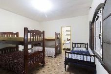 Casa em Peruíbe - Casa rústica com Wi-Fi, garagem e aceita pet