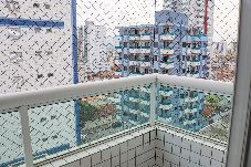 Apartment in Praia Grande - Apto com wi-fi, ar cond. e garagem à 100m da praia