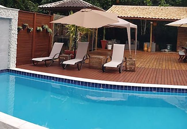Casa en Caraguatatuba - Casa com piscina e churrasqueira em Massaguaçu/SP